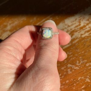 Rogers and Hollands opal princess cut ring